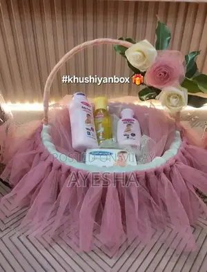 Photo - Handmade Pink Baby Gift Basket with Essential Care Products