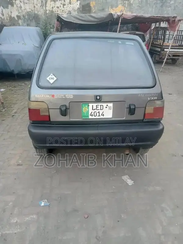 Mehran Used Car with Touchscreen AC and Alloy Rims