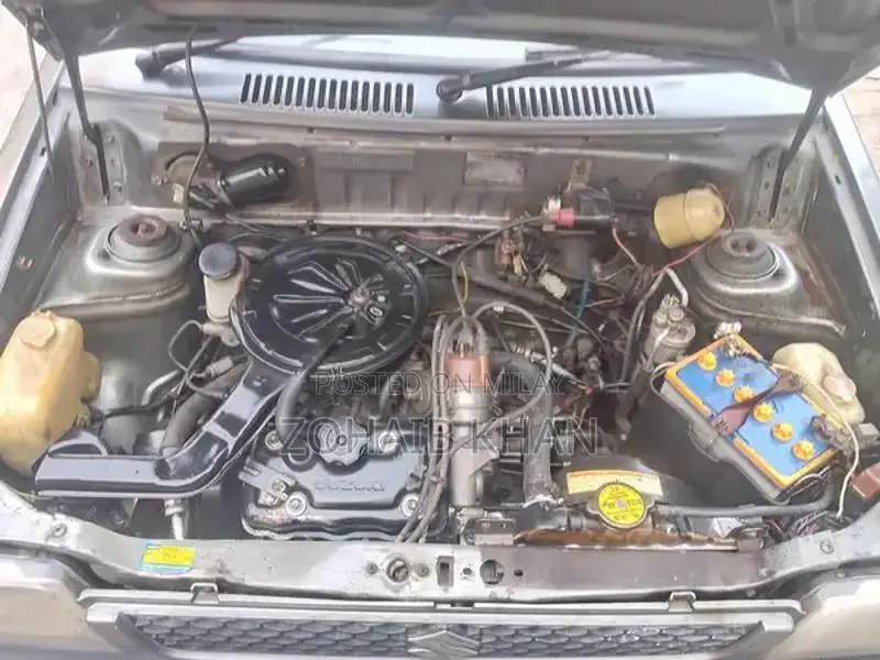 Mehran Used Car with Touchscreen AC and Alloy Rims