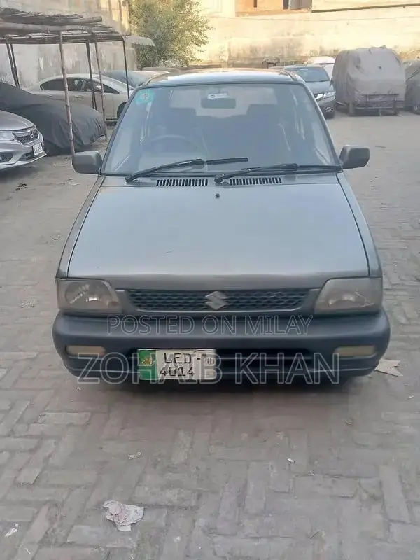 Mehran Used Car with Touchscreen AC and Alloy Rims