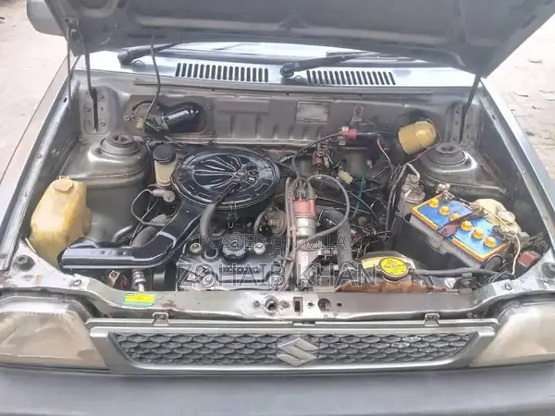 Mehran Used Car with Touchscreen AC and Alloy Rims