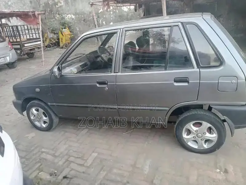 Mehran Used Car with Touchscreen AC and Alloy Rims