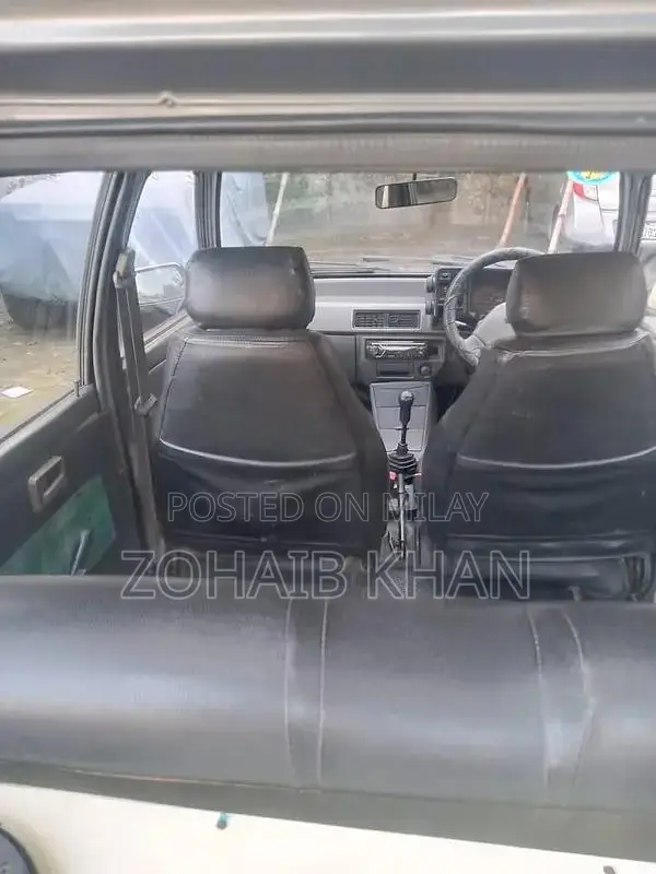 Mehran Used Car with Touchscreen AC and Alloy Rims