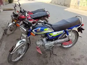 Photo - Honda 70 Motorcycle 2024/2025 Model Compact Commuter Bike