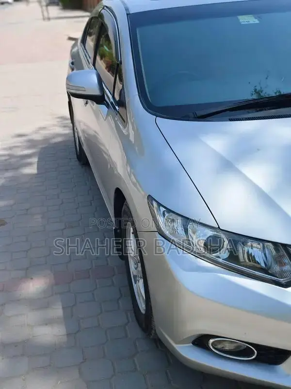 2013 Fender Vehicle with High Mileage and Touch Up