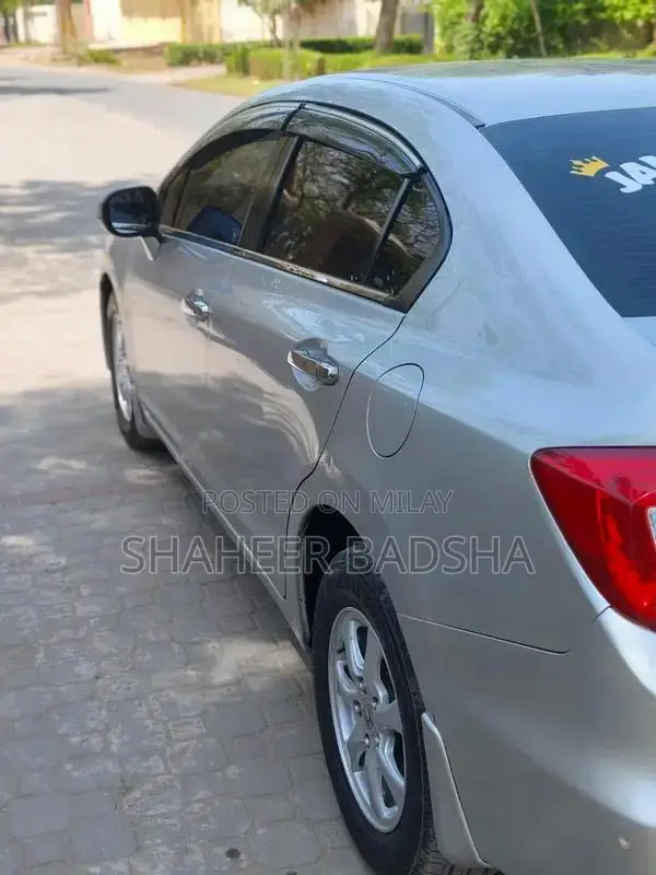 2013 Fender Vehicle with High Mileage and Touch Up