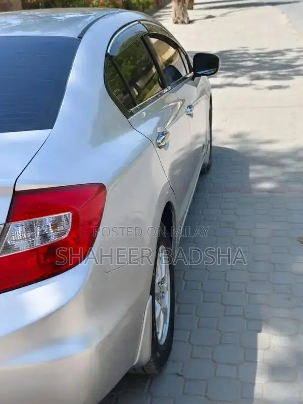 2013 Fender Vehicle with High Mileage and Touch Up