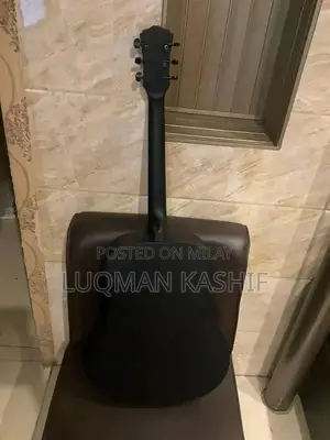 Kapok Jambo Size 4-String Guitar with Accessories