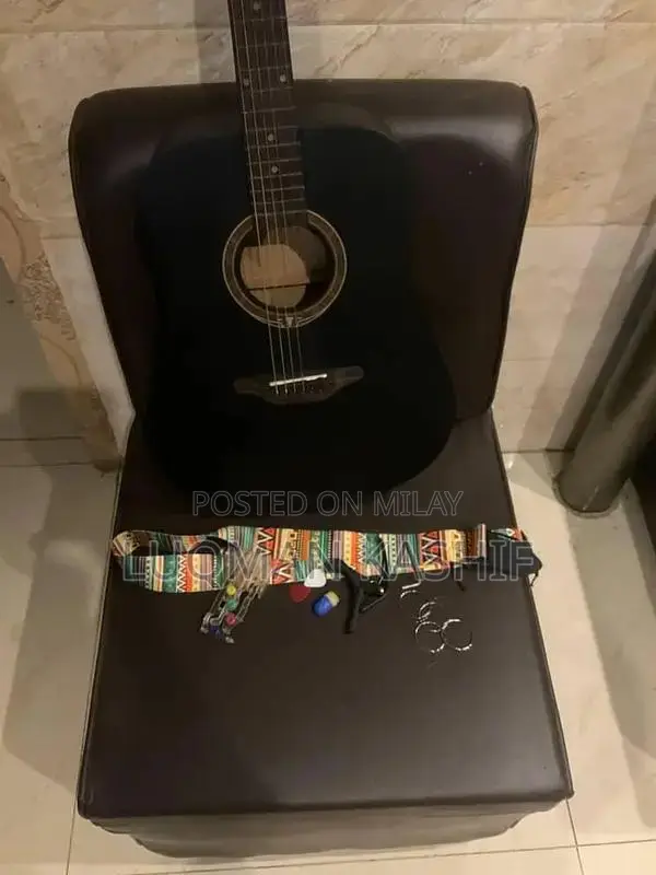 Kapok Jambo Size 4-String Guitar with Accessories