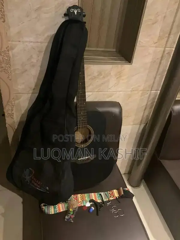 Kapok Jambo Size 4-String Guitar with Accessories