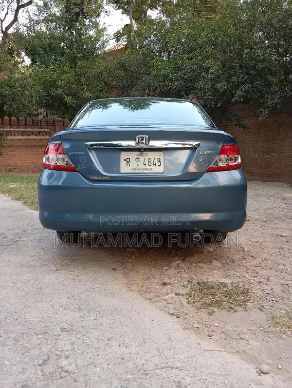 Honda City Sedan - Reliable Compact Car with Manual Transmission