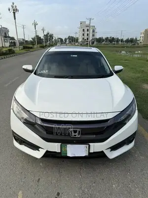 Photo - Honda Civic VTi Oriel Prosmatec Sedan - Premium Compact Car