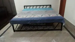 Photo - Versatile Bed Frame for Multiple Sleeping Configurations