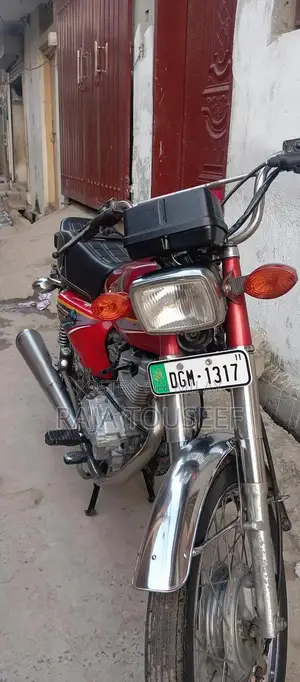 Photo - Honda 125 Motorcycle - Reliable Urban Commuter Bike