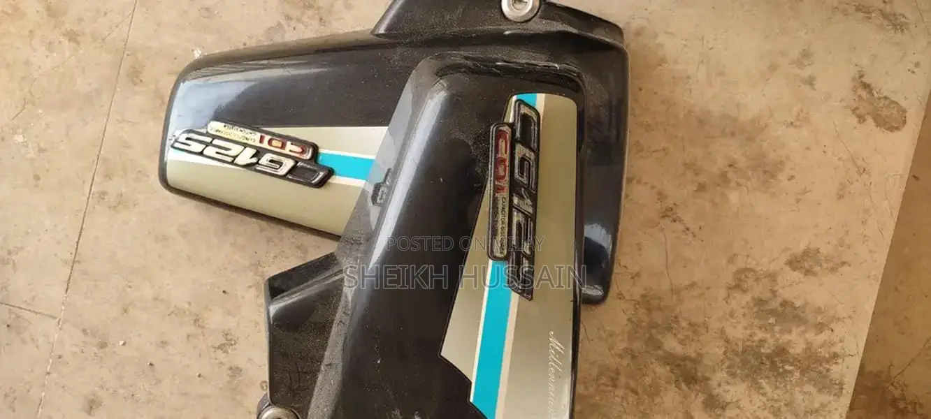 Honda 125cc Motorcycle Parts - Side Cover and Silencer