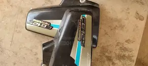 Photo - Honda 125cc Motorcycle Parts - Side Cover and Silencer