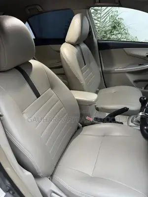 Toyota GLI Silver Sedan - Well Maintained Condition