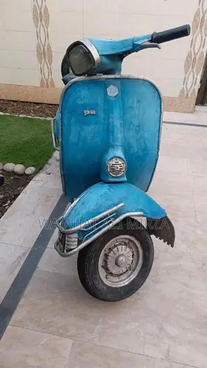 Photo - Vintage 1977 Blue Vespa Scooter - Classic Italian Design