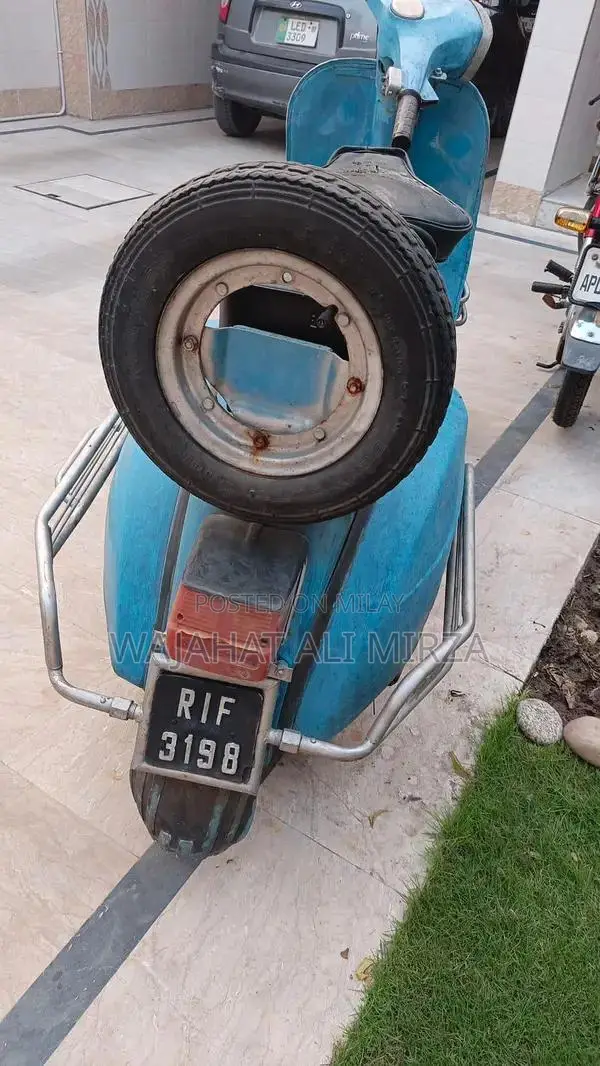 Vintage 1977 Blue Vespa Scooter - Classic Italian Design