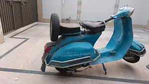 Vintage 1977 Blue Vespa Scooter - Classic Italian Design