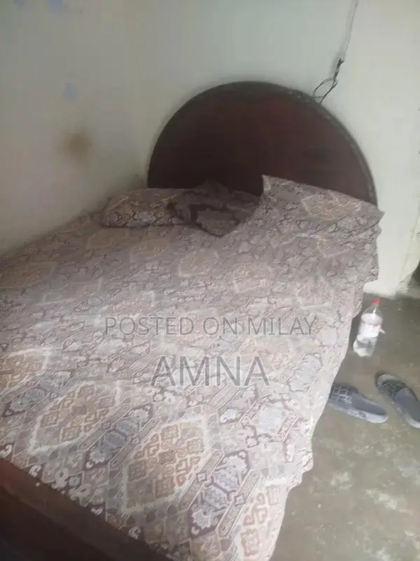 Used Bed Frame with Minor Sheet Wear