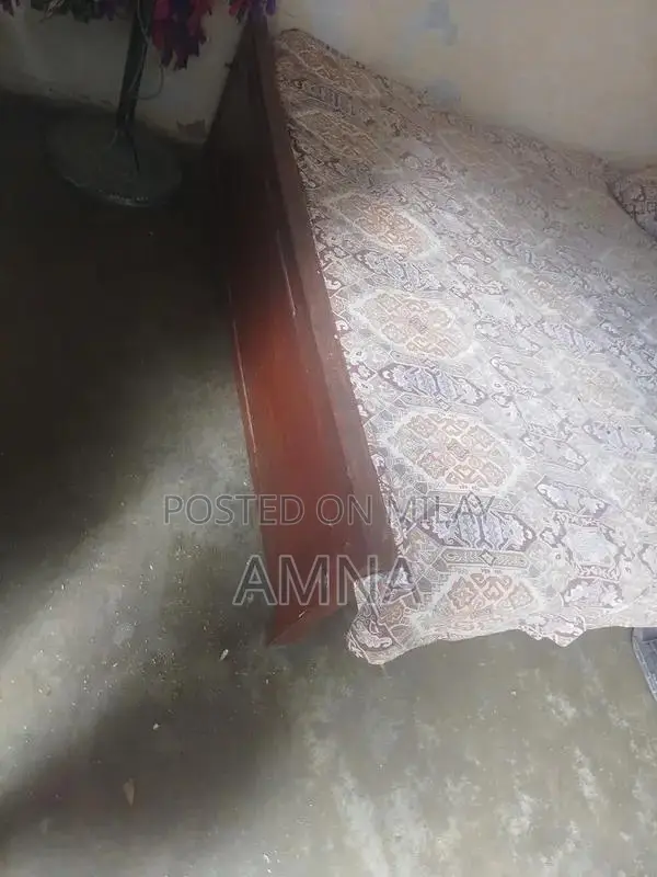 Used Bed Frame with Minor Sheet Wear