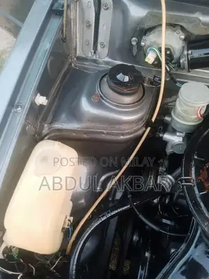 Reliable Sedan with Functional AC and Low Mileage