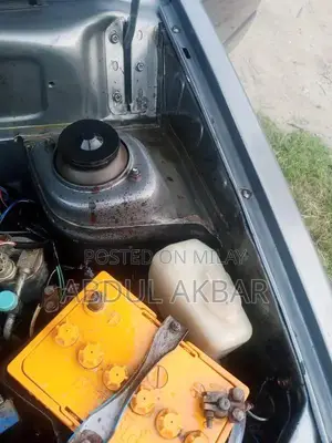 Reliable Sedan with Functional AC and Low Mileage