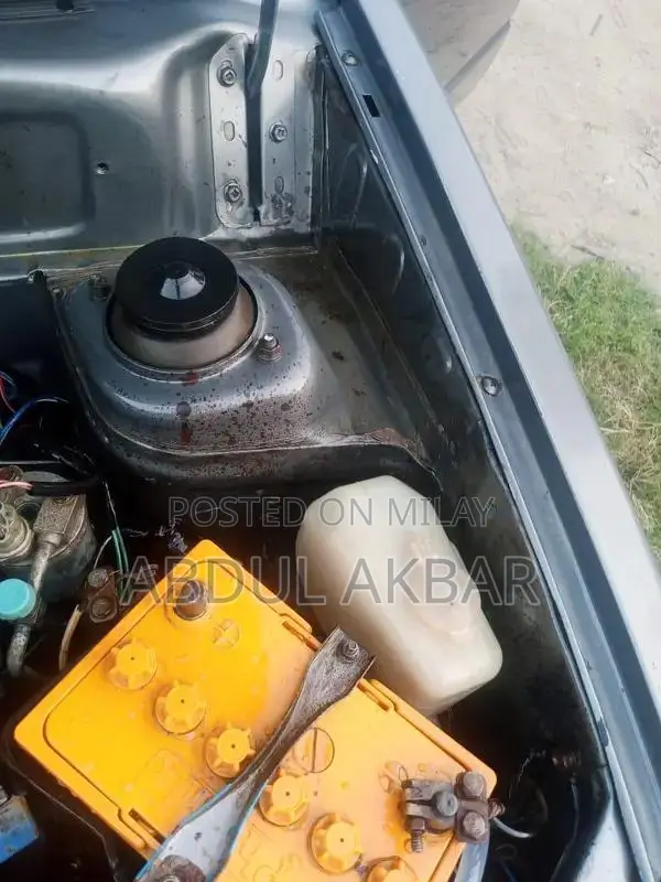 Reliable Sedan with Functional AC and Low Mileage