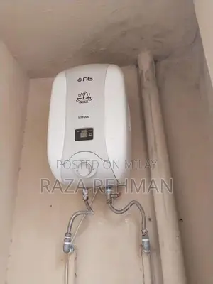 Photo - Compact Instant Water Geyser - Lightly Used Heating Appliance