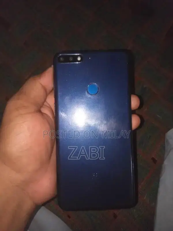 Compact Smartphone with Moderate Wear and Functionality