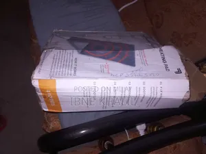 Photo - Physiotherapy Heat Massaging Weighted Heating Pad by Sharper Image