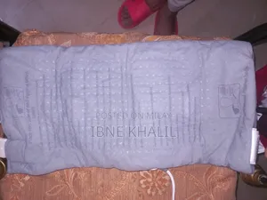 Physiotherapy Heat Massaging Weighted Heating Pad by Sharper Image