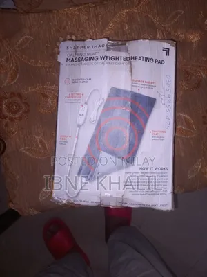 Physiotherapy Heat Massaging Weighted Heating Pad by Sharper Image