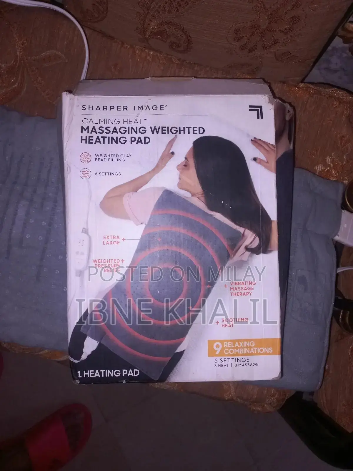 Physiotherapy Heat Massaging Weighted Heating Pad by Sharper Image