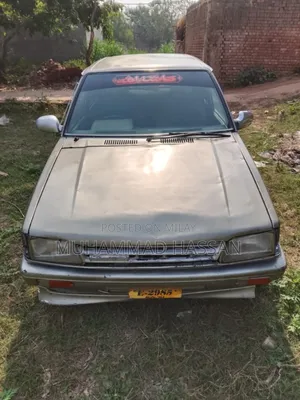 Photo - Daihatsu Charade 1984 Gold