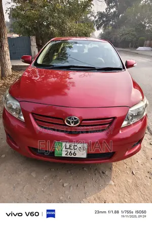 Photo - Toyota Corolla LE 4dr Sedan (1.8L 4cyl 4A) 2010 Red