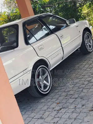 Photo - Toyota Corolla II 1990 White