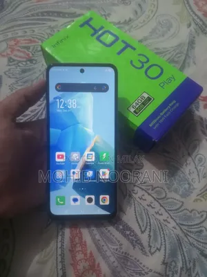 Photo - Infinix Hot 30 Play NFC 128 GB White