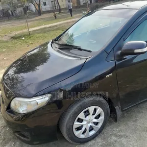 Photo - Toyota Corolla Base 4dr Sedan (1.8L 4cyl 5M) 2010 Black