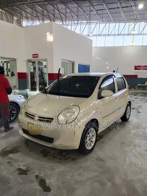 Photo - Toyota Passo 1.0 FWD 2011 Beige