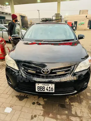 Toyota Corolla Base 4dr Sedan (1.8L 4cyl 5M) 2010 Black